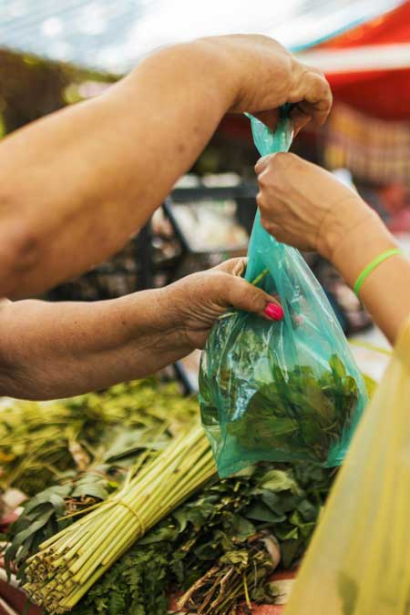 Fresh produce bag ready for pickup at Jimz Farmstand